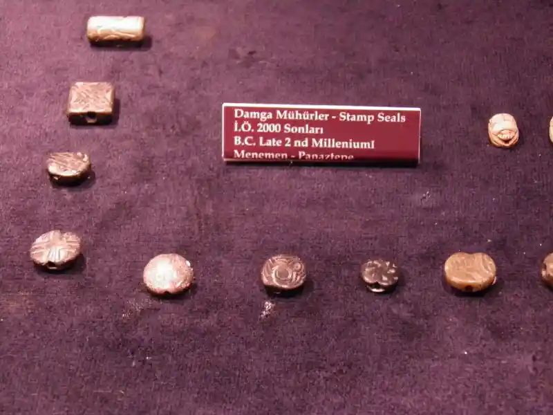 Angles forming a cross carved into circular stamp seals, dated 2nd millennium BC, located at Archaeological Museum of Izmir, Turkey